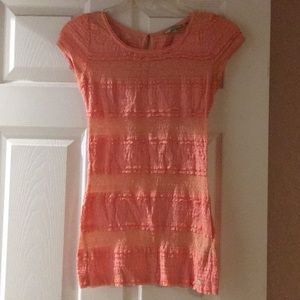 Salmon colored mesh top